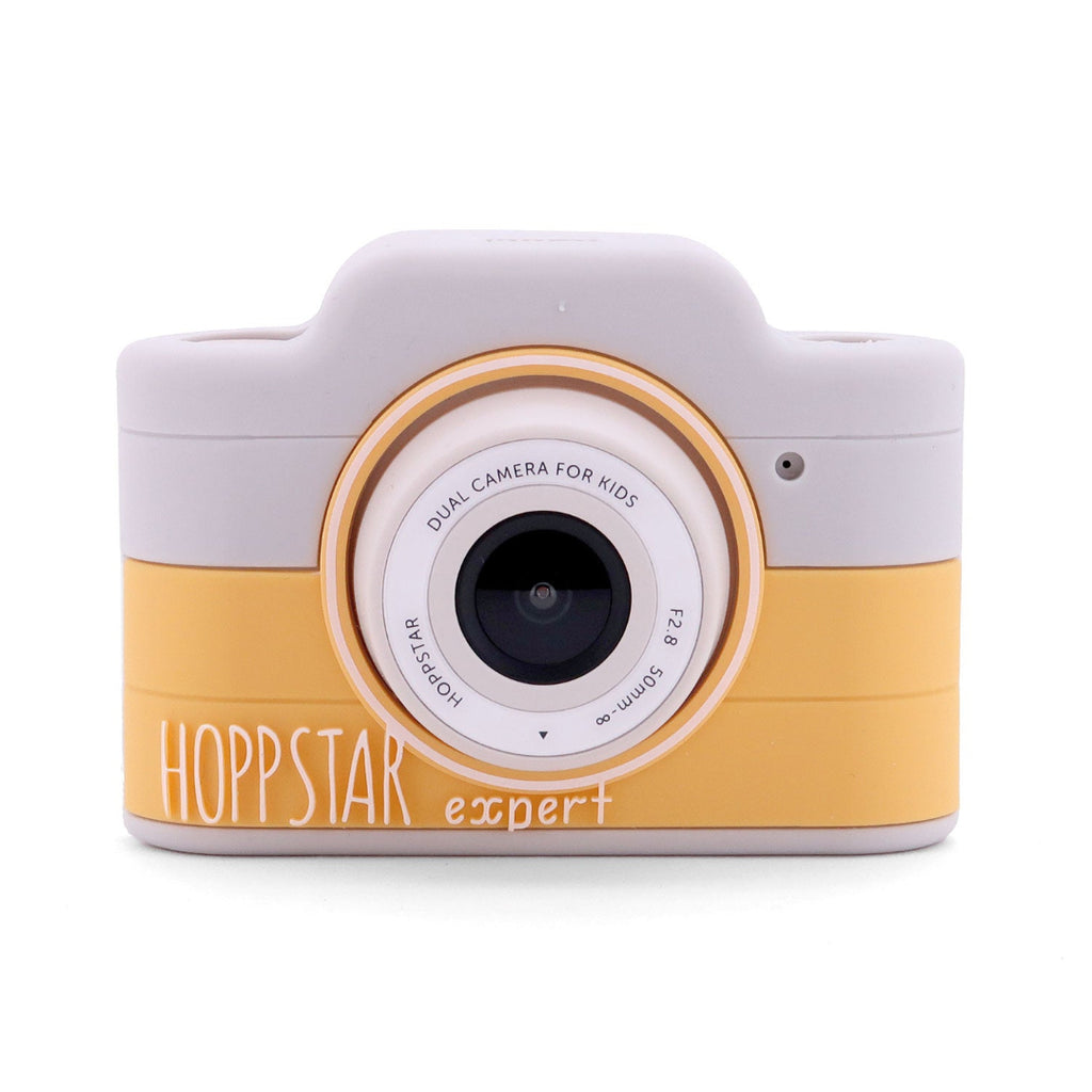 Yellow and gray toy camera with 'Hoppstar expert' branding on a white background