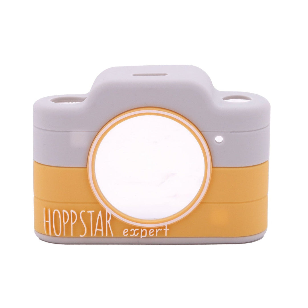 Camera-solicone sleeve with 'Hoppstar expert' branding on a white background
