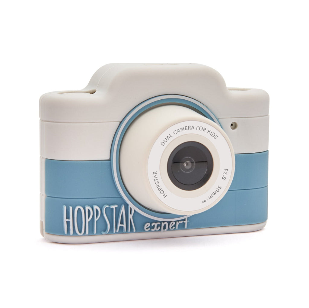 Small camera-shaped container with 'Hopp Star' branding on a white background