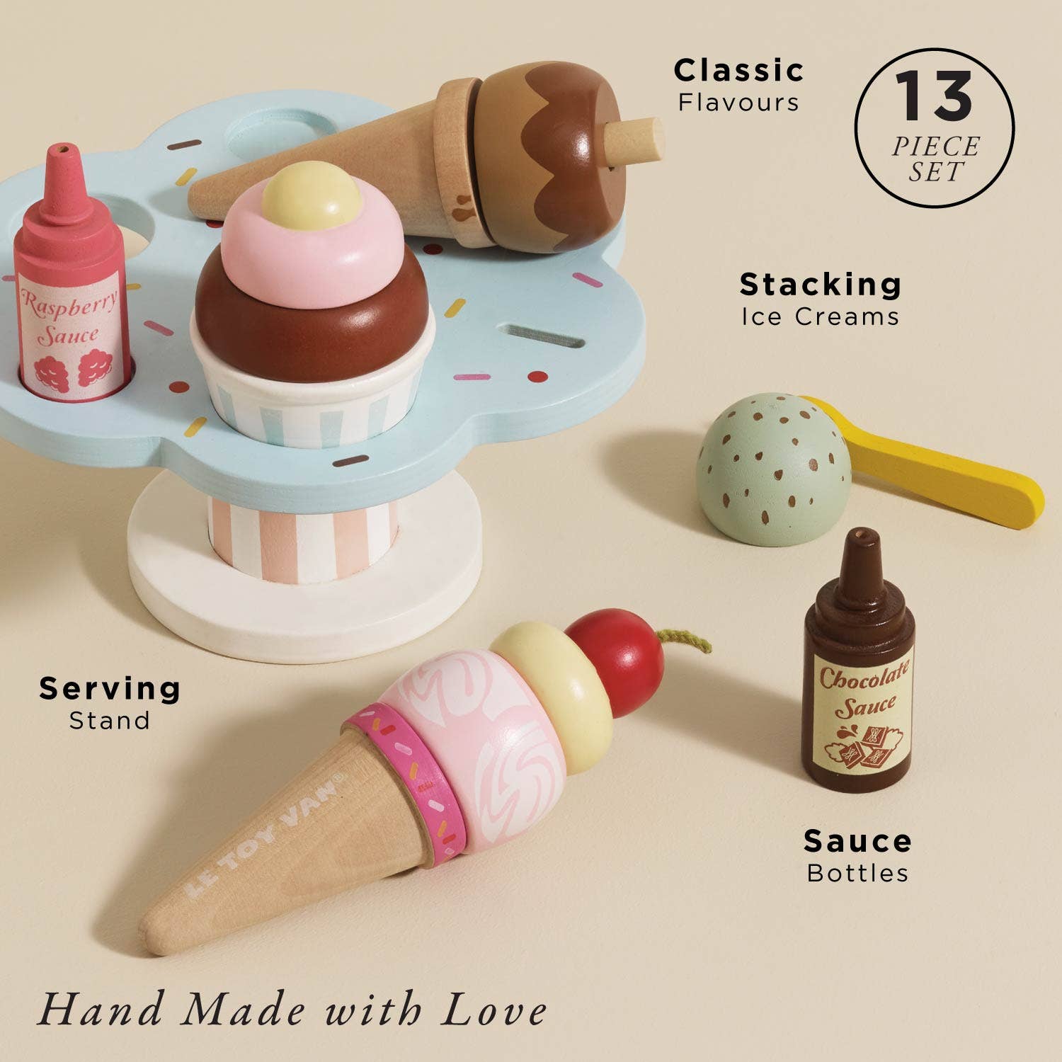 Wooden ice cream set with serving stand, ice cream cones, and sauce bottles on a beige background.