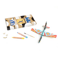 Coloring book with pencils and markers on a white background