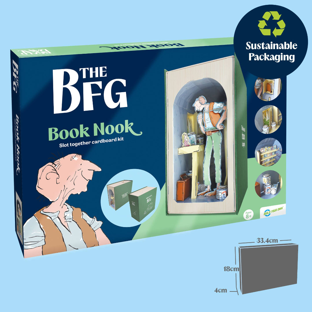 The BFG Book Nook slot together cardboard kit packaging shown on a light blue background, with a circular 'Sustainable Packaging' badge and a small dimension graphic indicating 33.4 cm by 18 cm by 4 cm.