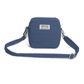 Blue crossbody bag with a visible brand label on a white background