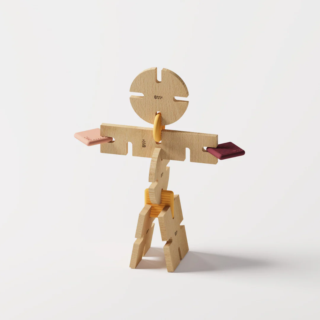 Wooden toy figure with a round head and rectangular body on a white background