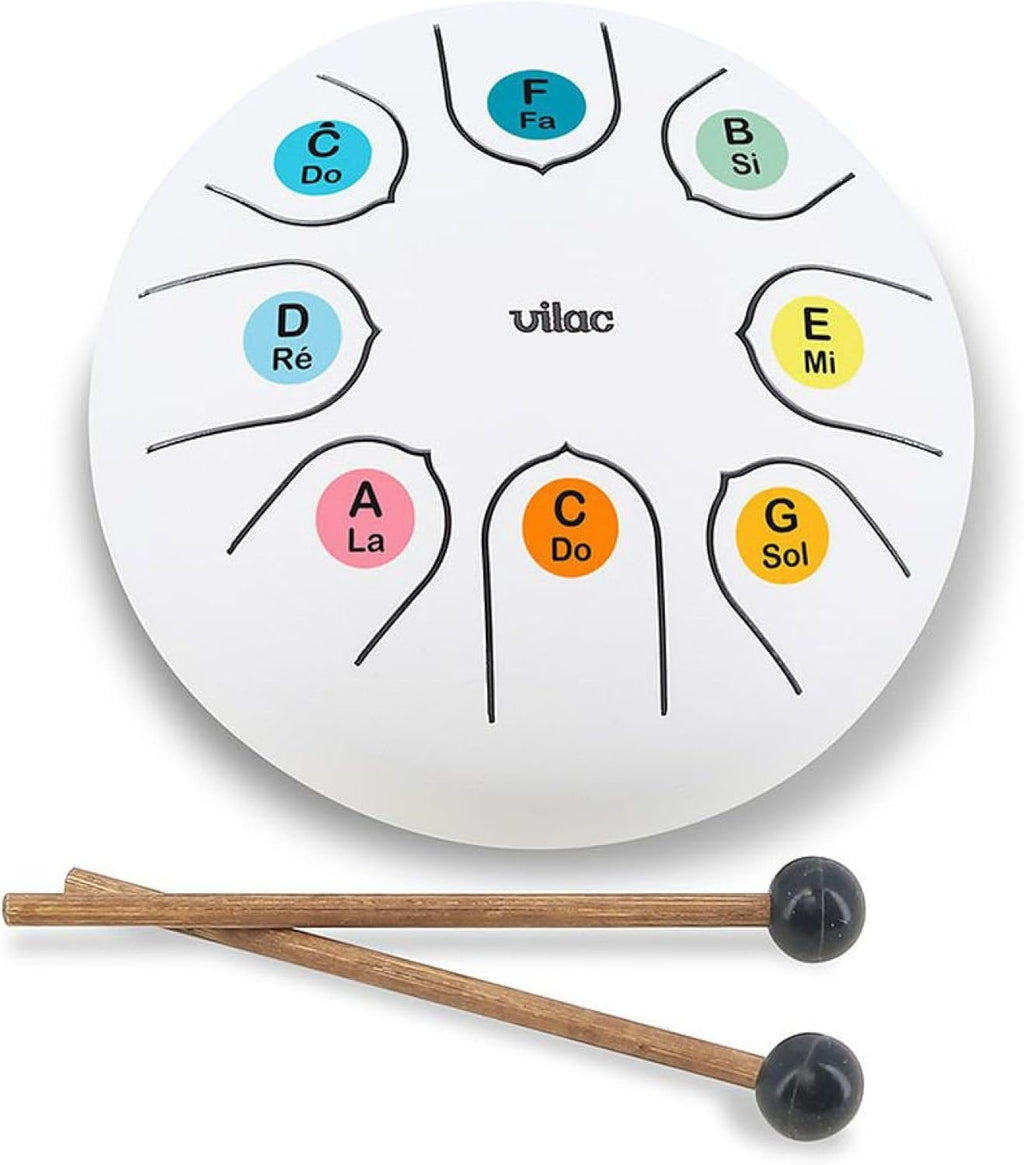 White musical instrument with colored notes and two mallets on a white background