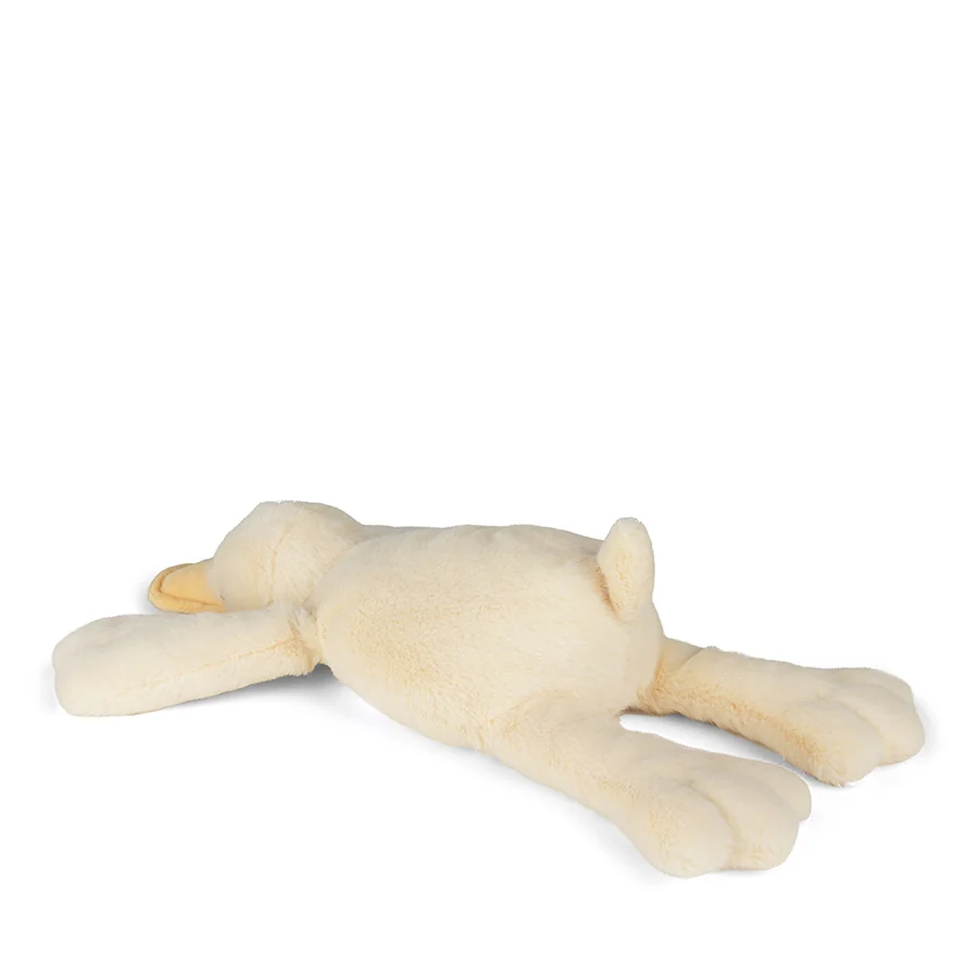 Beige dog-shaped plush toy on a white background