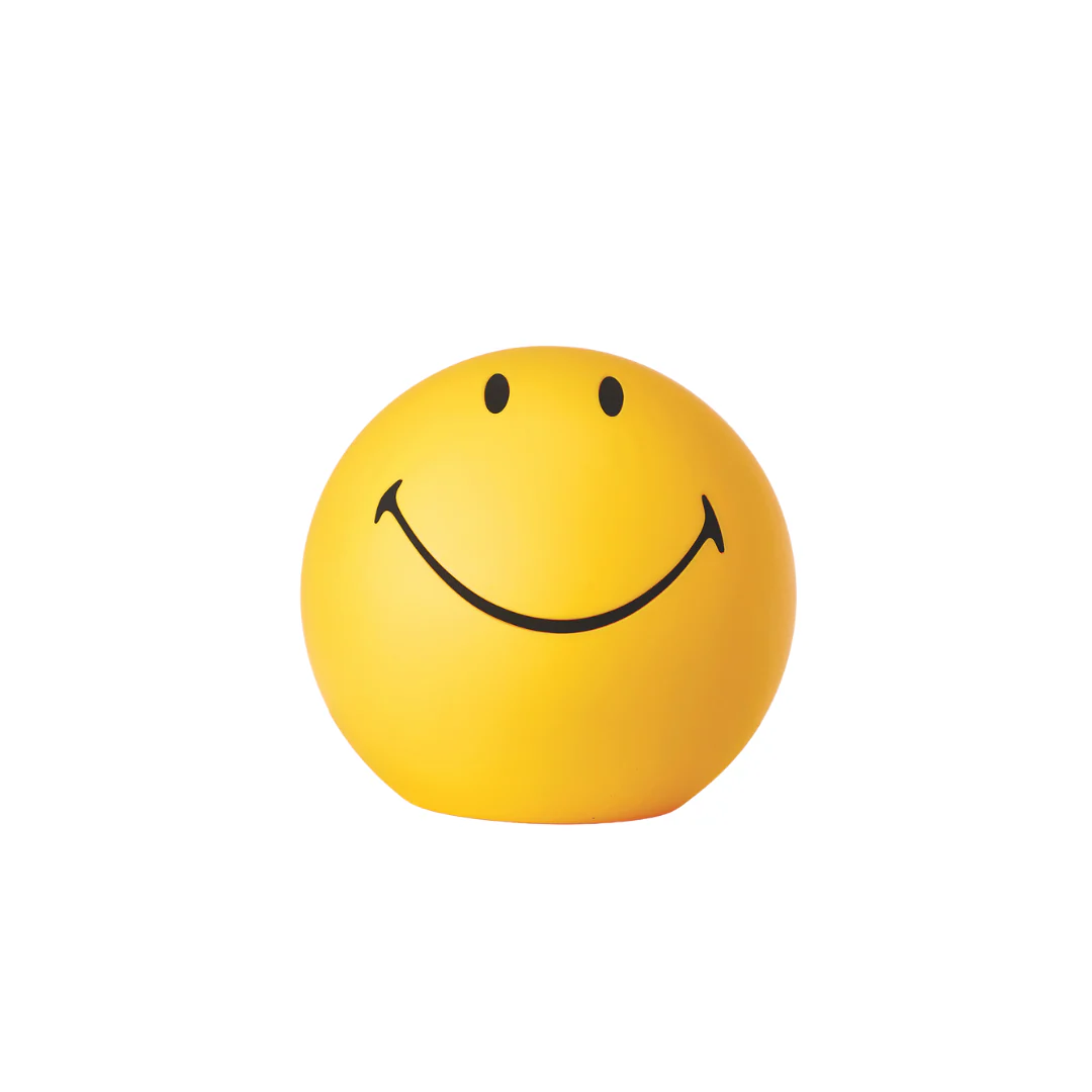 Yellow smiley face ball light on a white background