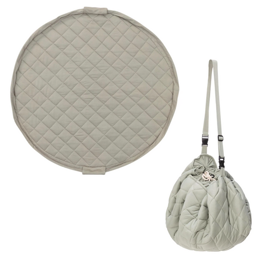 Quilted green bag with matching round cushion on a white background