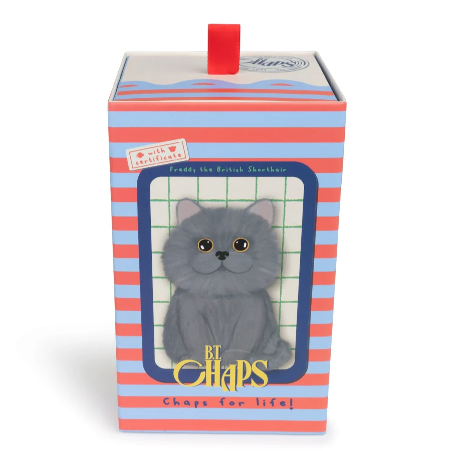 Plush cat toy in a striped box with 'Chaps' branding