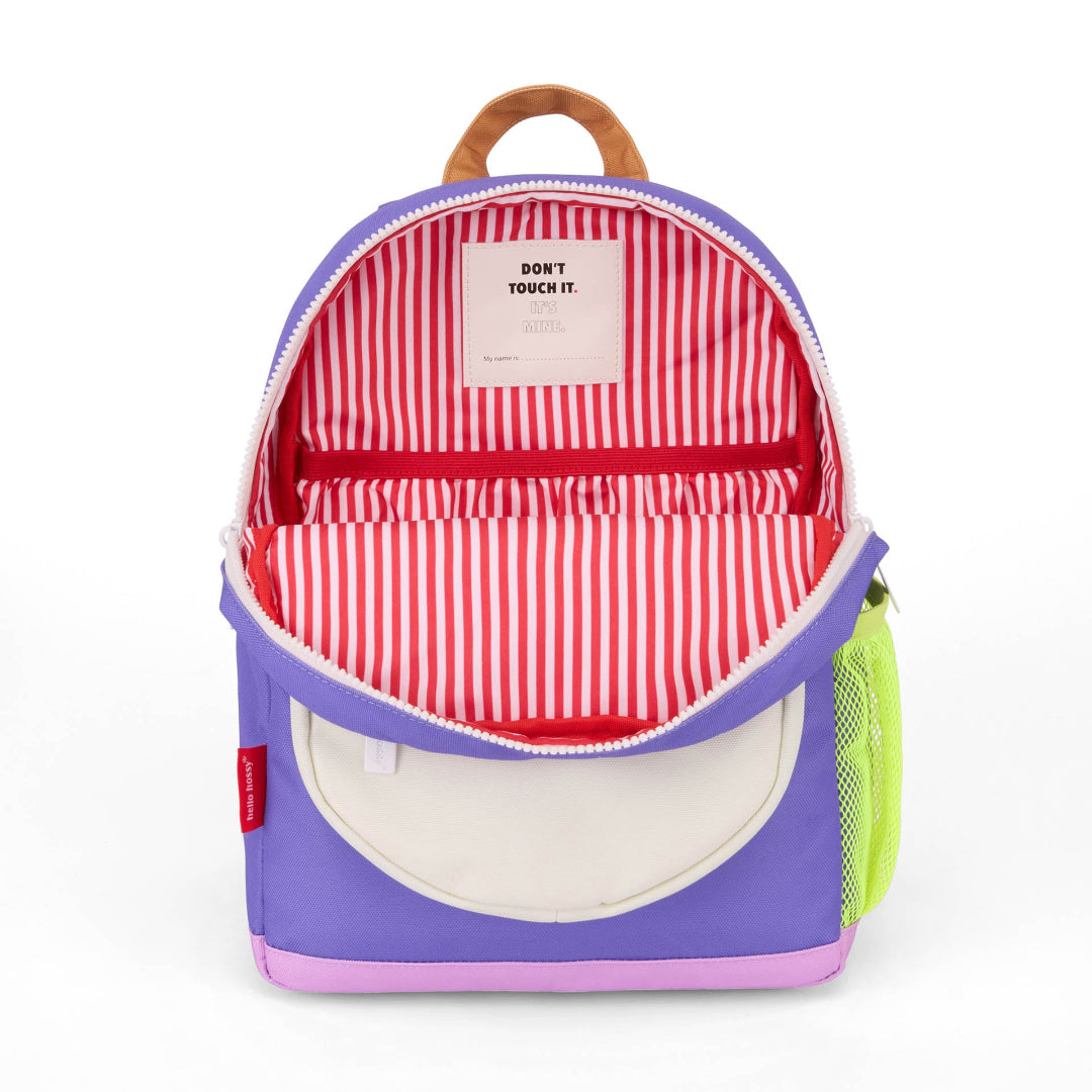 Purple pet backpack with open front, red and white striped interior, and 'Don't Touch It' label.