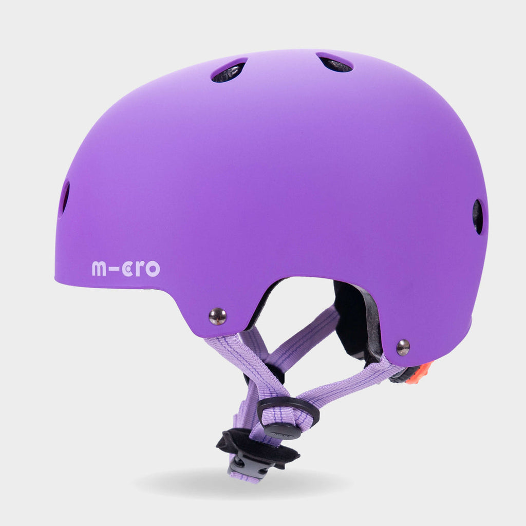 Side view of the purple Micro plain kids' helmet showing the air vents