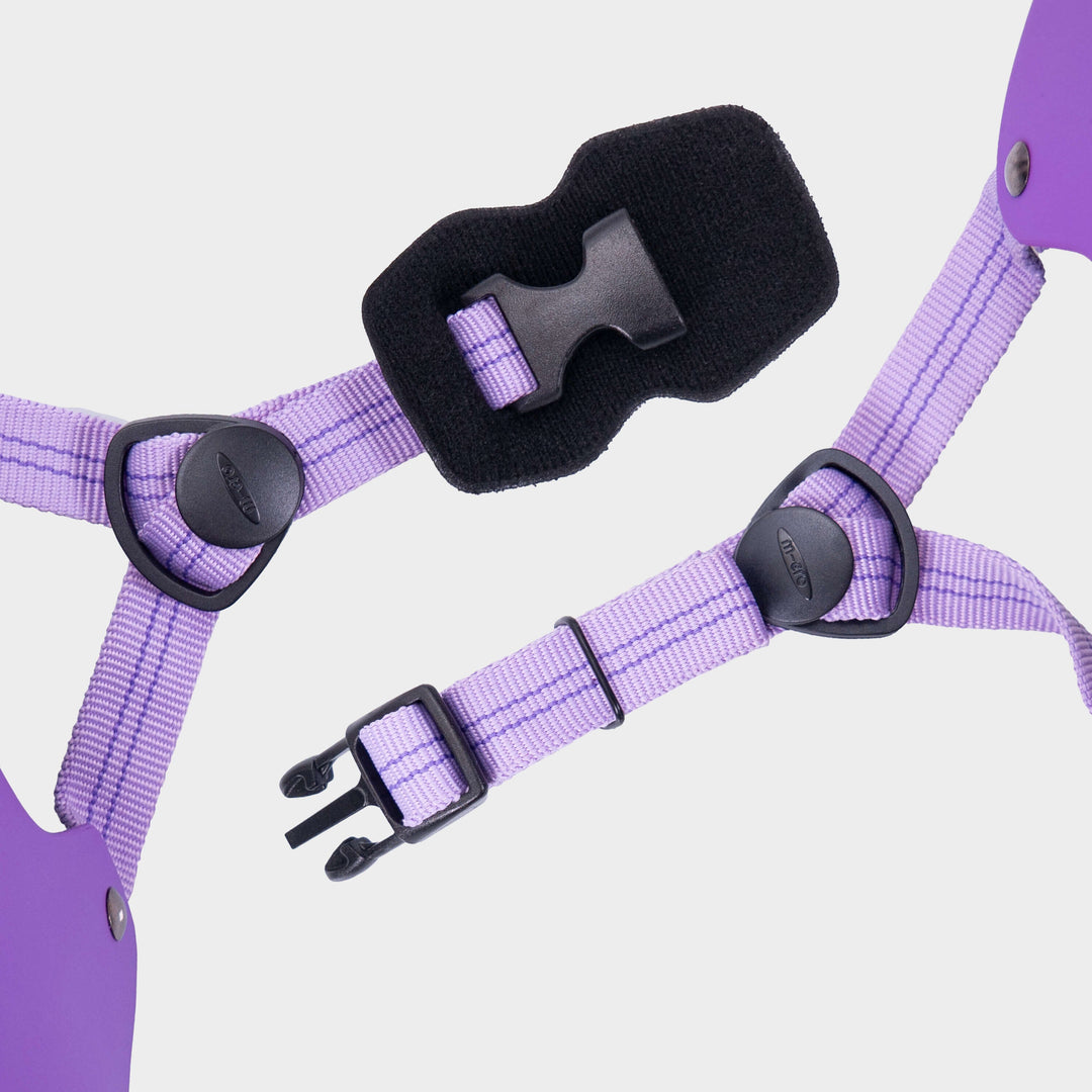Close-up of the lilac adjustable straps and black buckle on the Micro plain helmet