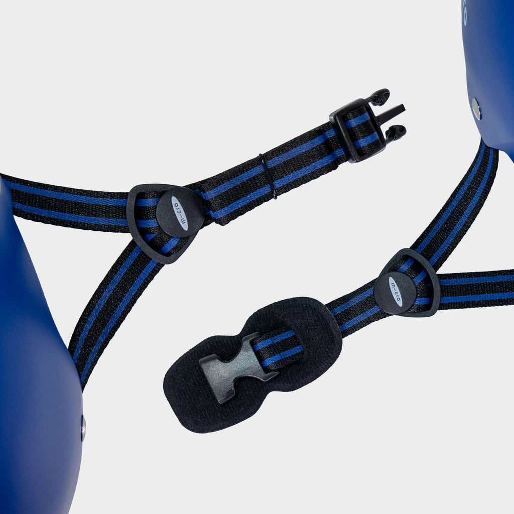 Close-up of the blue and black adjustable straps and buckle on the Micro Eco helmet