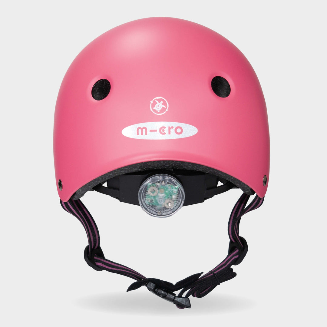 Back of the pink Micro Eco helmet showing the rear light and micro logo