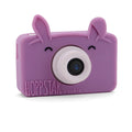 Purple toy camera with bunny ears on a white background