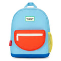 blue backpack with red pocket and yellow mesh pocket in a room.