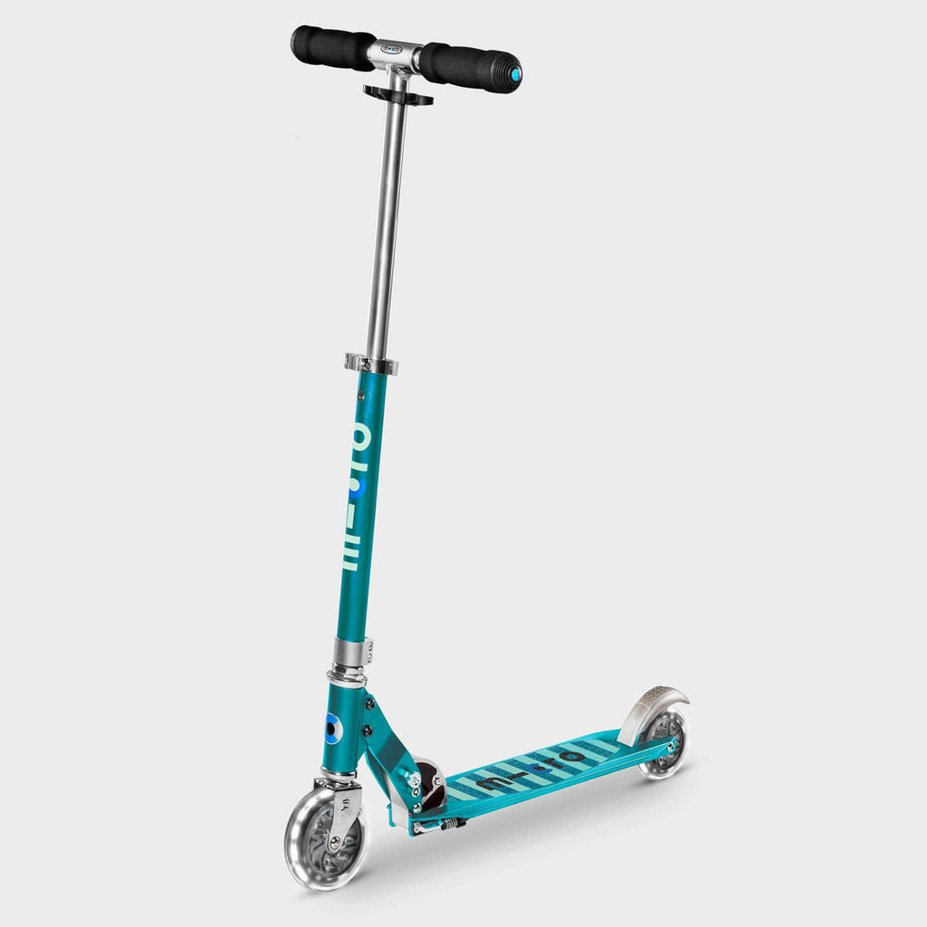 Micro Sprite LED two-wheel scooter in aqua with black handlebar grips and light-up wheels